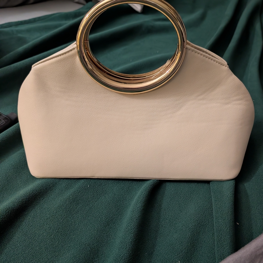 Elegant Cream Handbag with Gold Accents